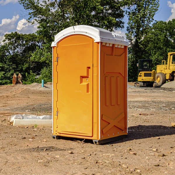 how often are the portable restrooms cleaned and serviced during a rental period in Grant County